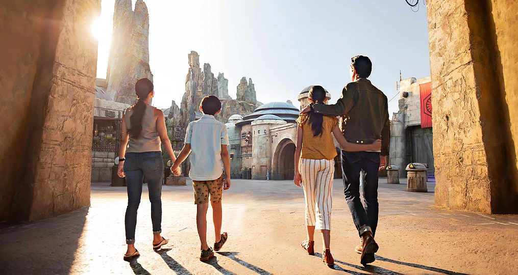 family walking around holding hands