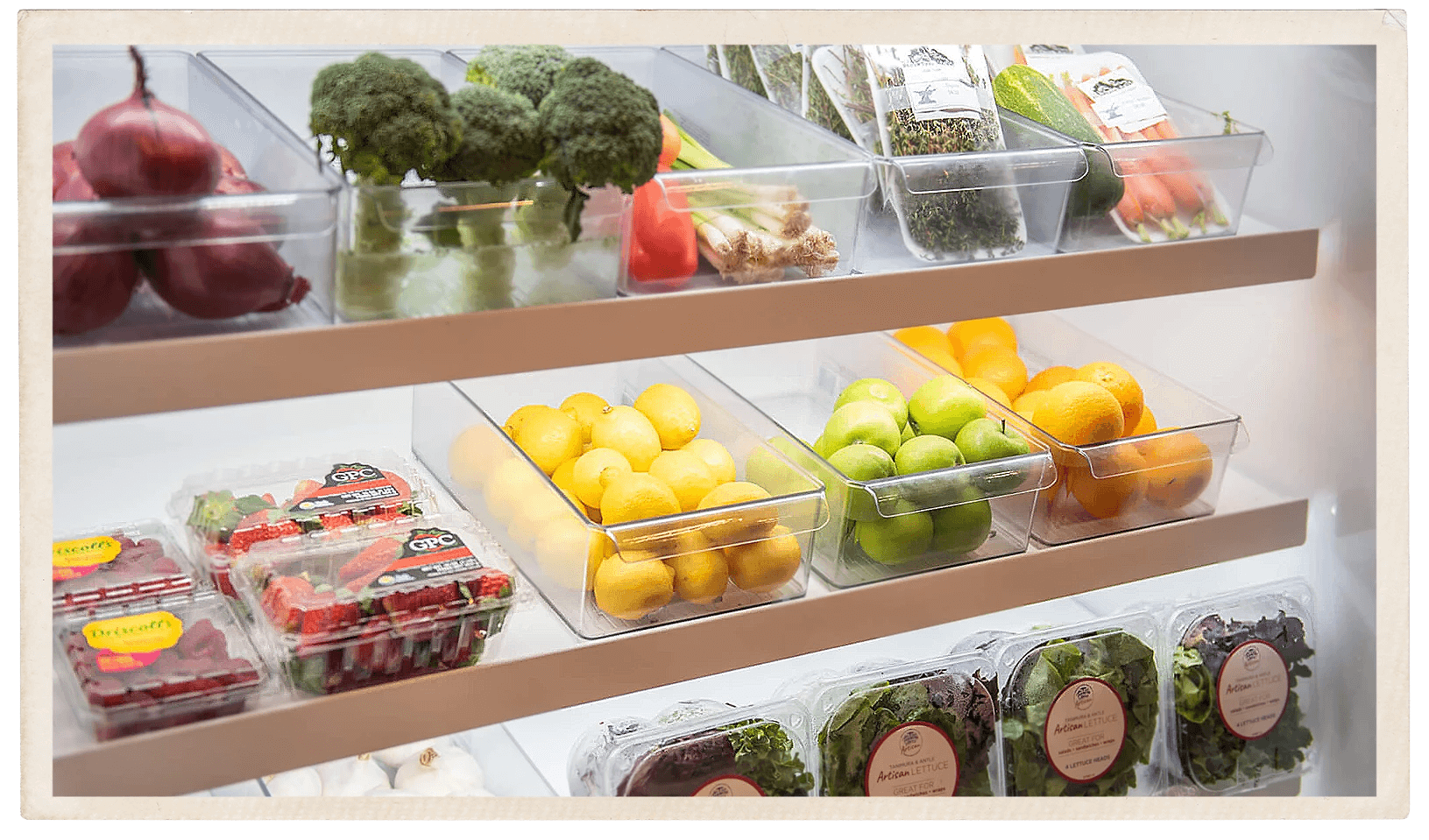 a shelf with plastic containers of fruits and vegetables