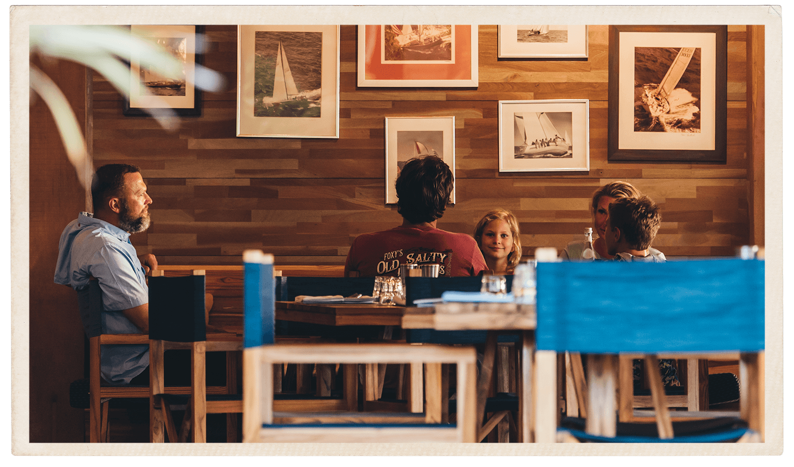 a group of people sitting at a table