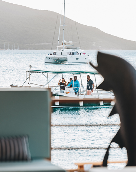 a group of people on a boat in the water