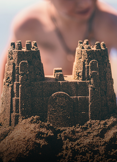 a sand castle in the sand