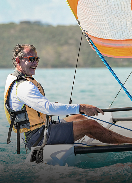 a man in a boat smiling