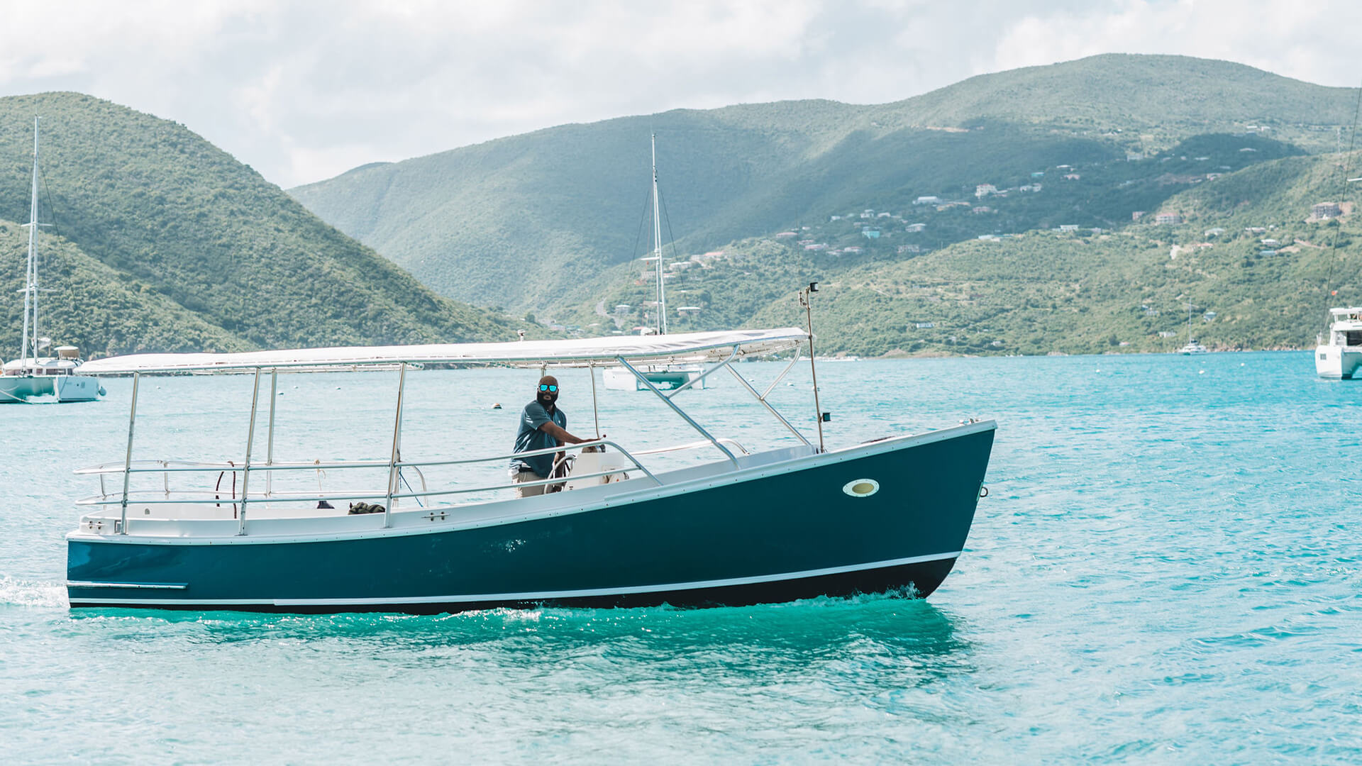 a man on a boat in the water
