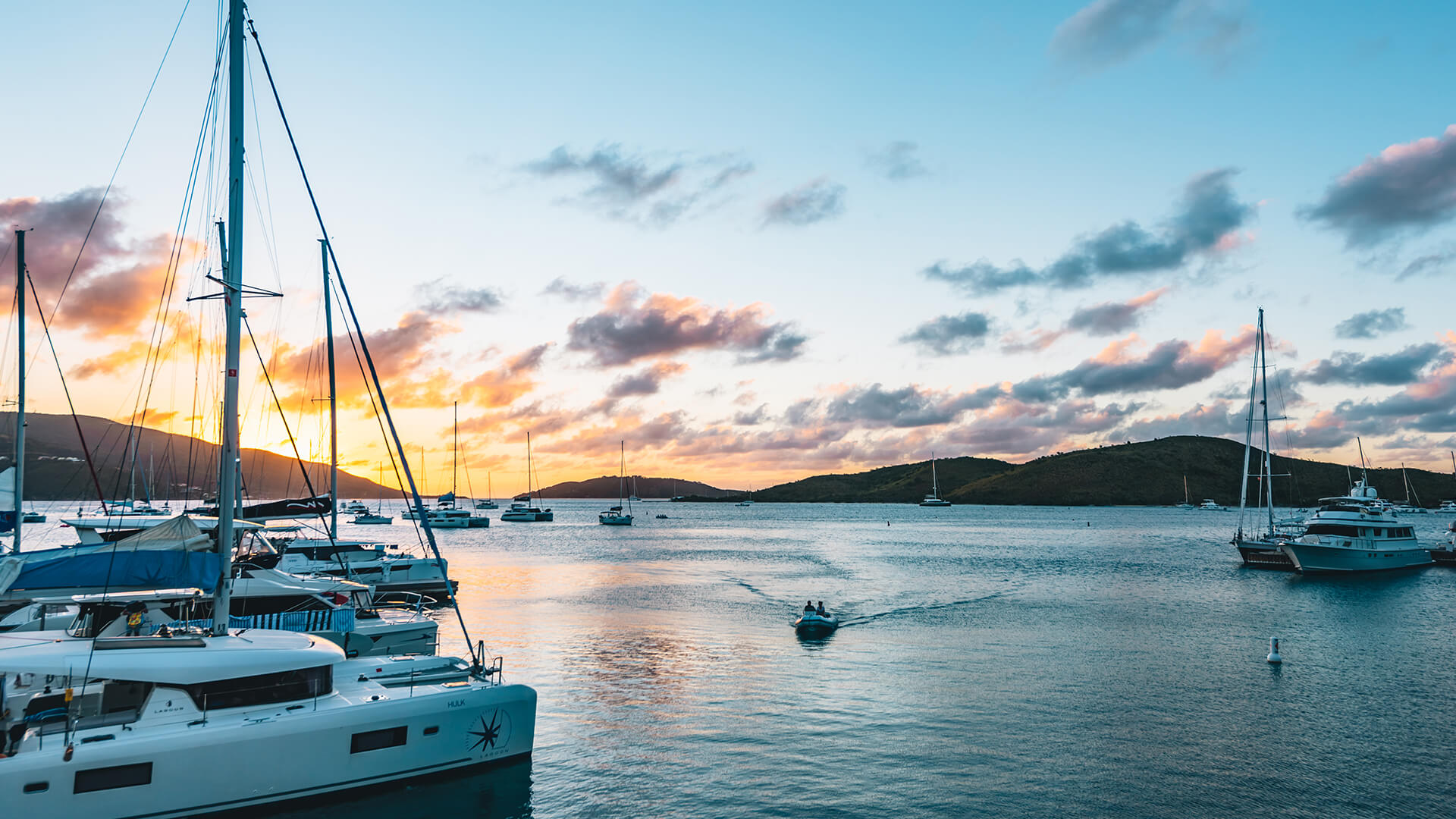 a group of boats in a body of water