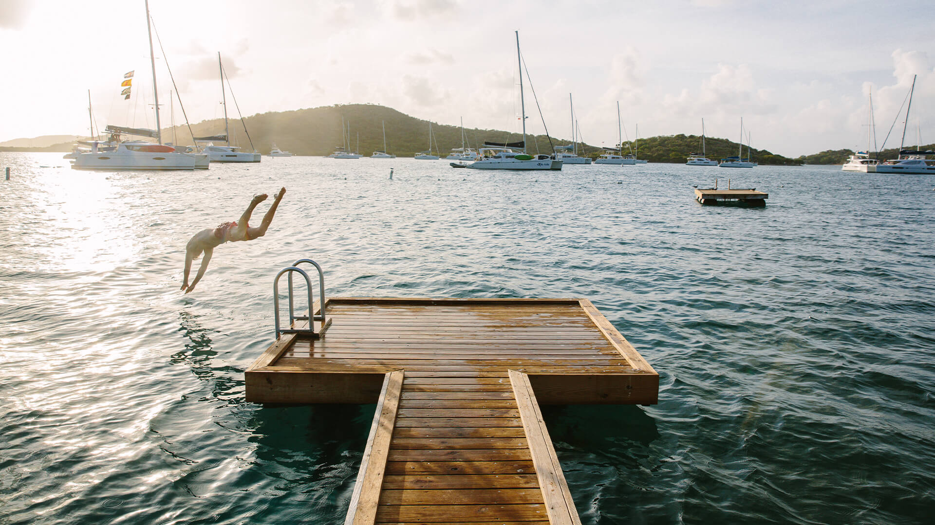 a person jumping into the water