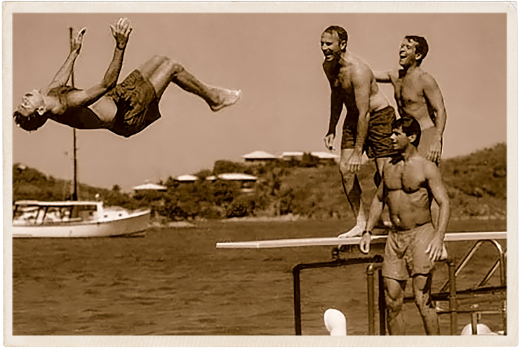 a group of men jumping off a diving board