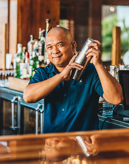 a man holding a shaker
