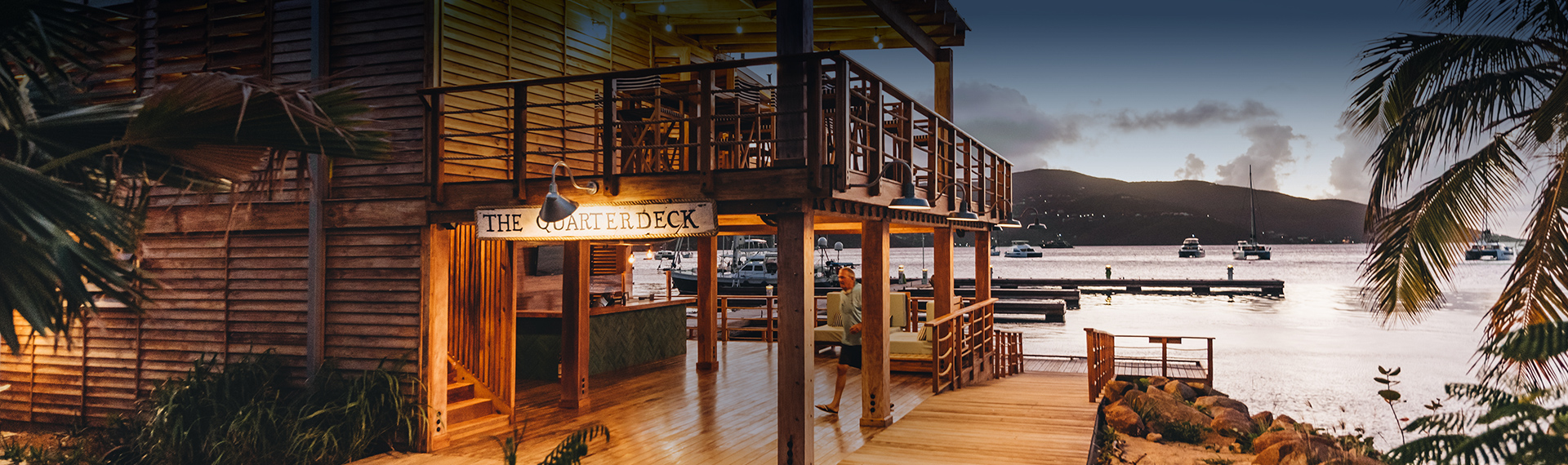 a man walking on a deck