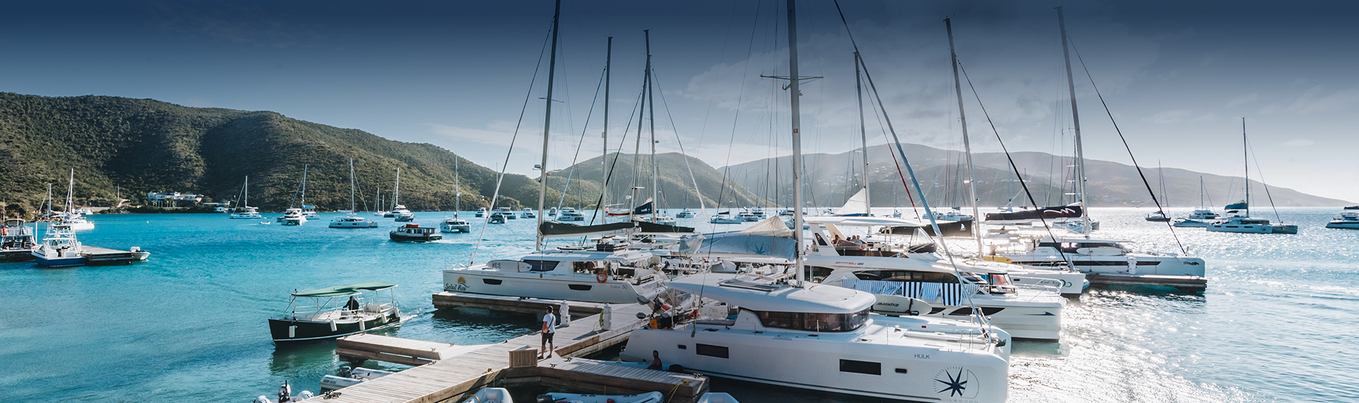 a group of boats on a dock