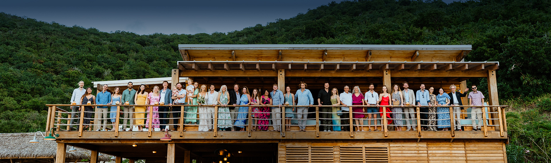 a group of people standing on a balcony