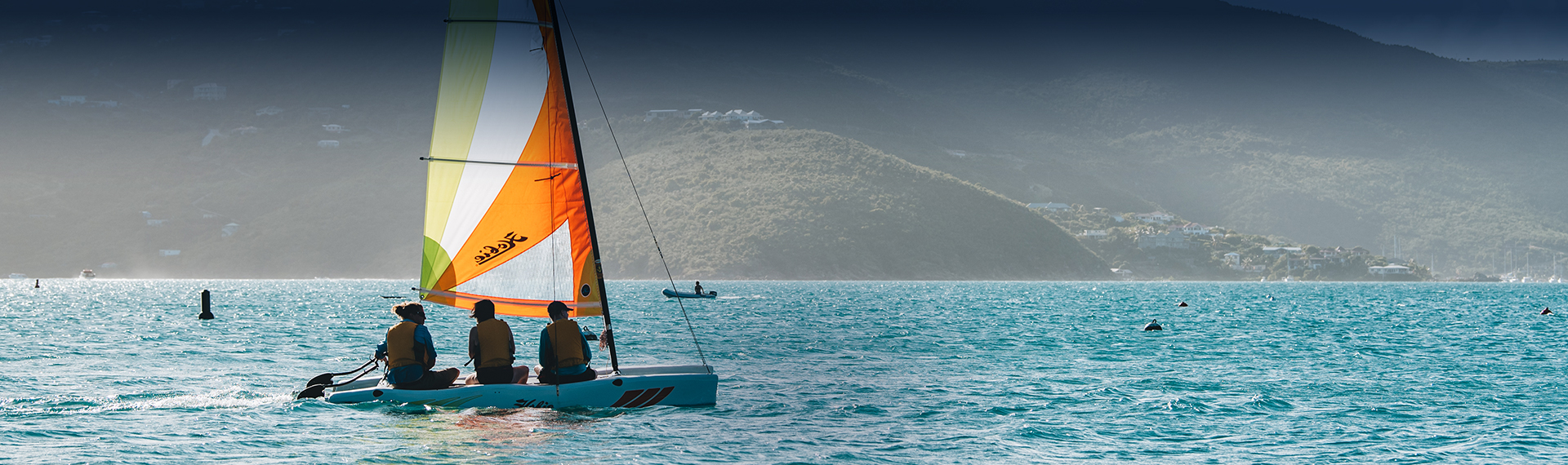 a person in a boat on the water