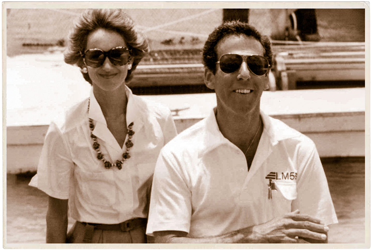 a man and woman wearing sunglasses