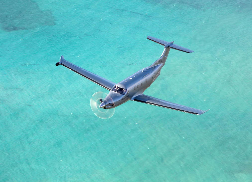 a plane flying over water