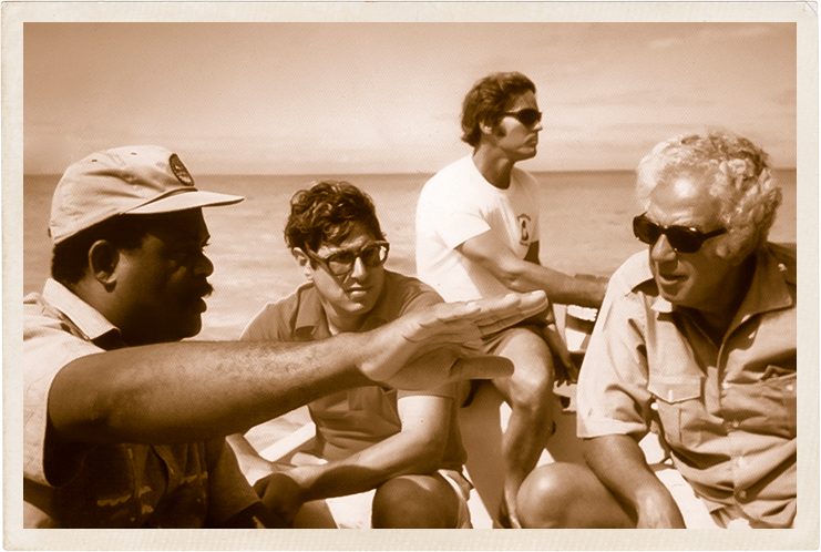 a group of men on a boat