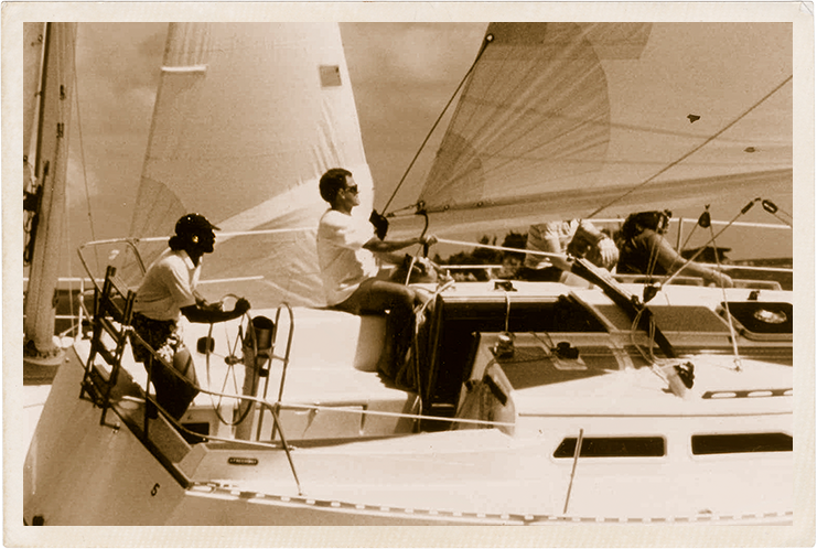 a group of people on a sailboat