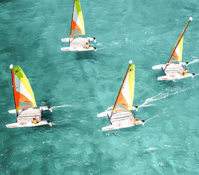 a group of sailboats in the water