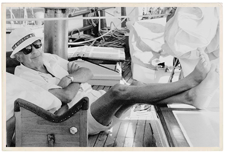 a man sitting on a deck