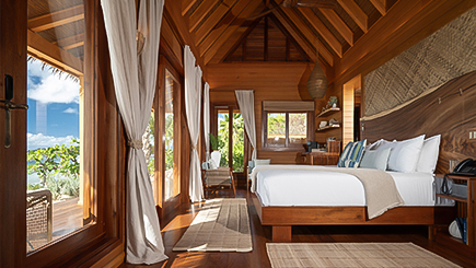 a room with a bed and a window