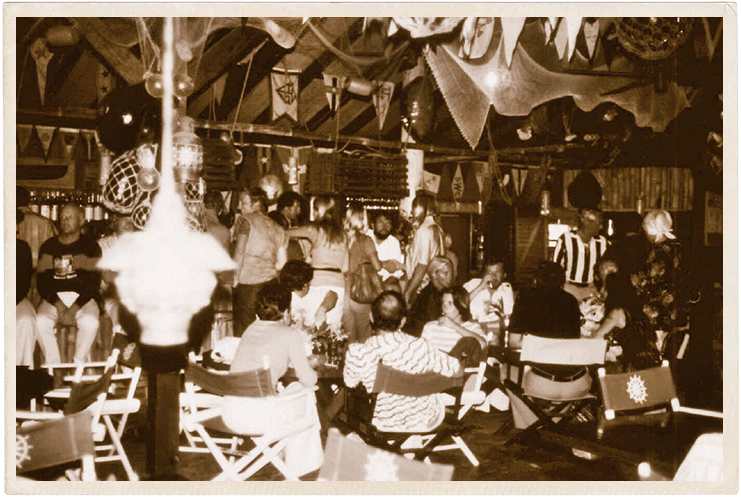 a group of people sitting around a table