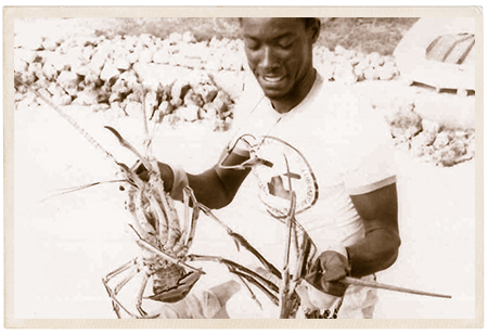 a man holding a crab