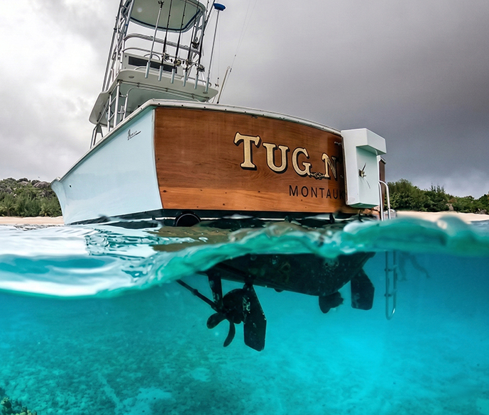 a boat under water with a boat in the water