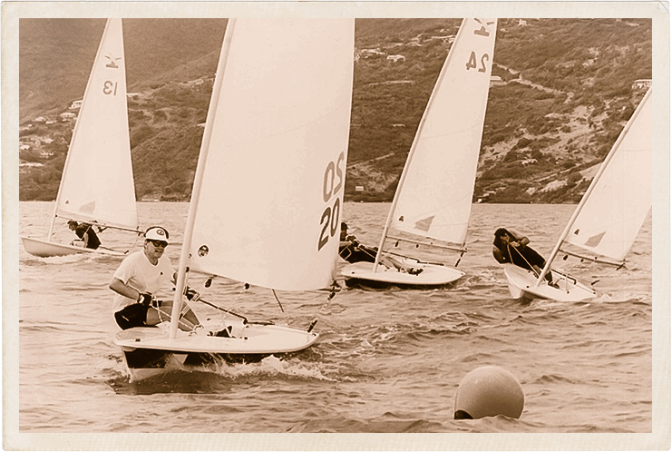 a group of people sailing on water