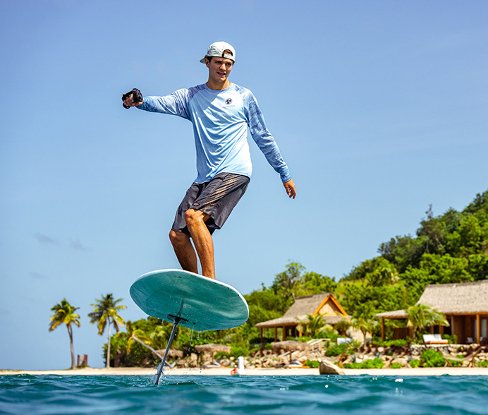 a man on a surfboard in the water