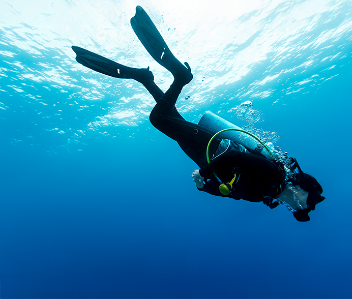 a person in a scuba suit underwater