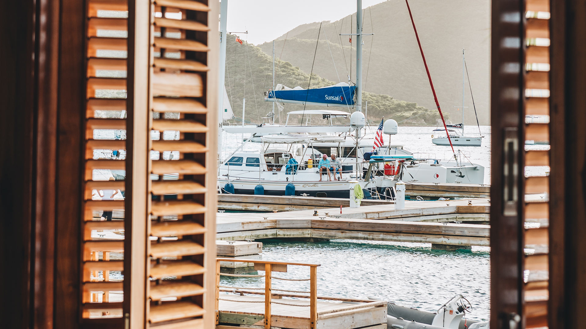 a group of people on a boat in a harbor