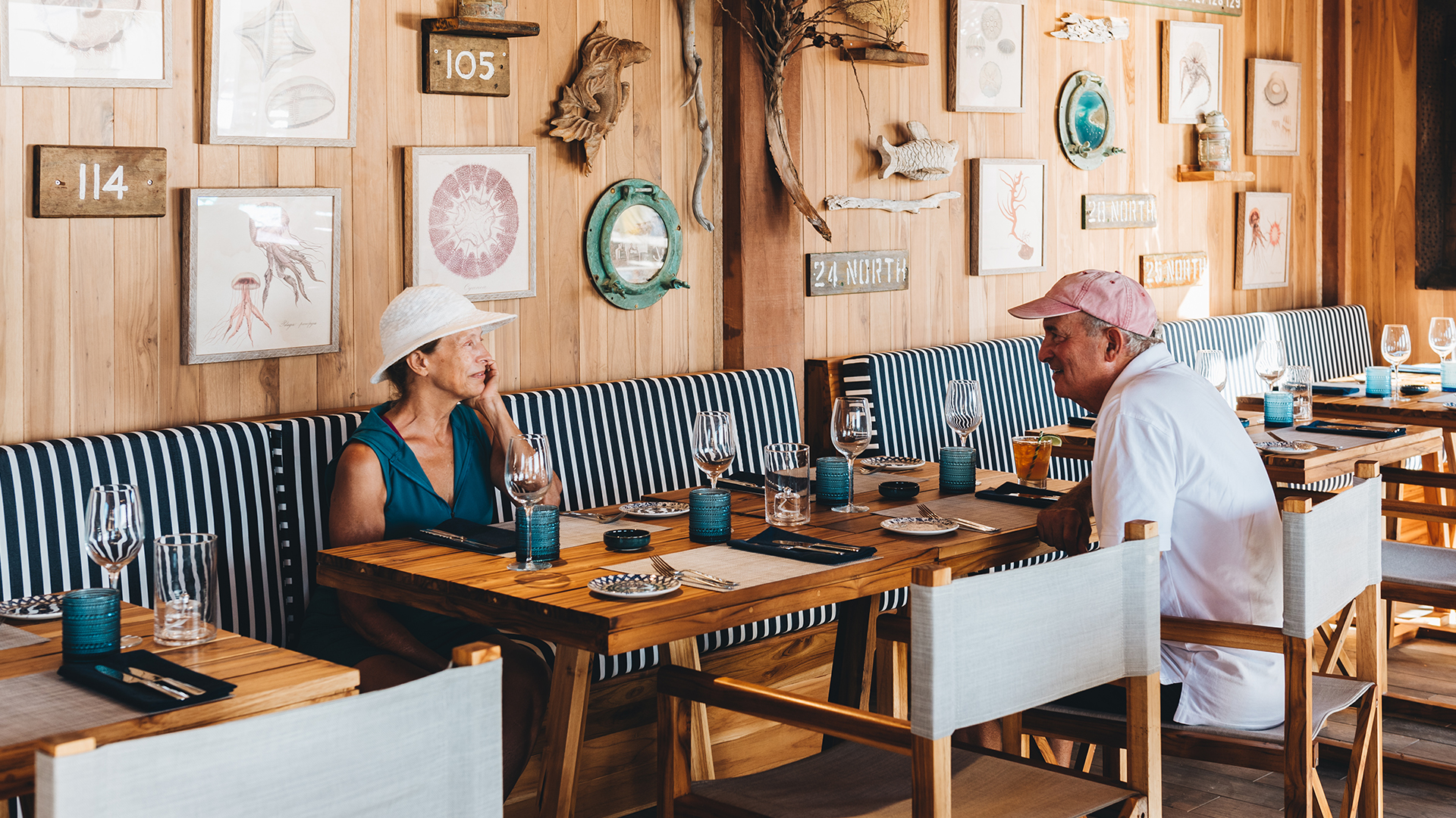 a man and woman sitting at a table