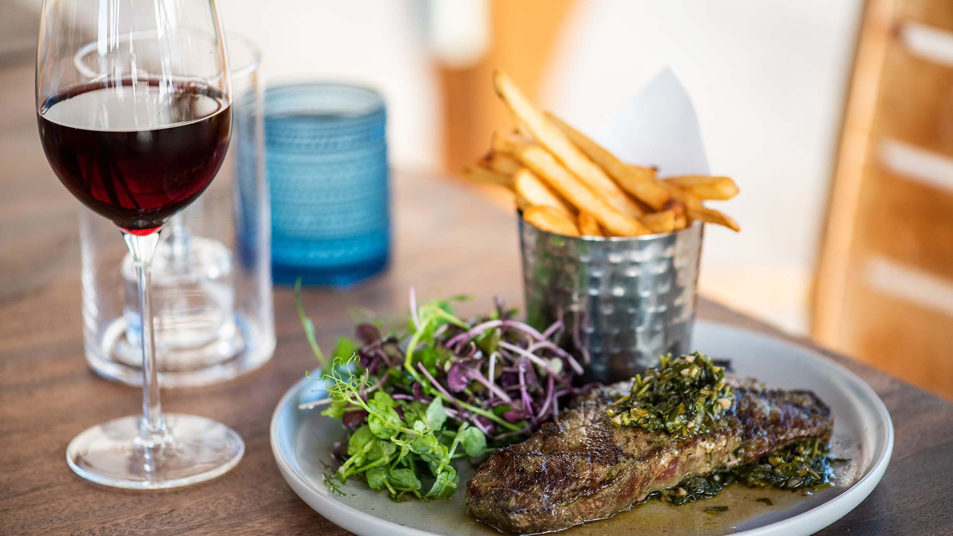 a plate of steak and fries