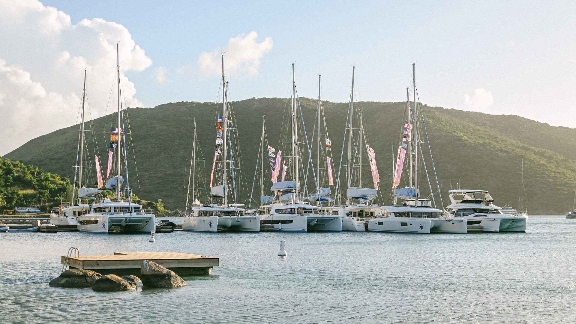 a group of boats in a harbor