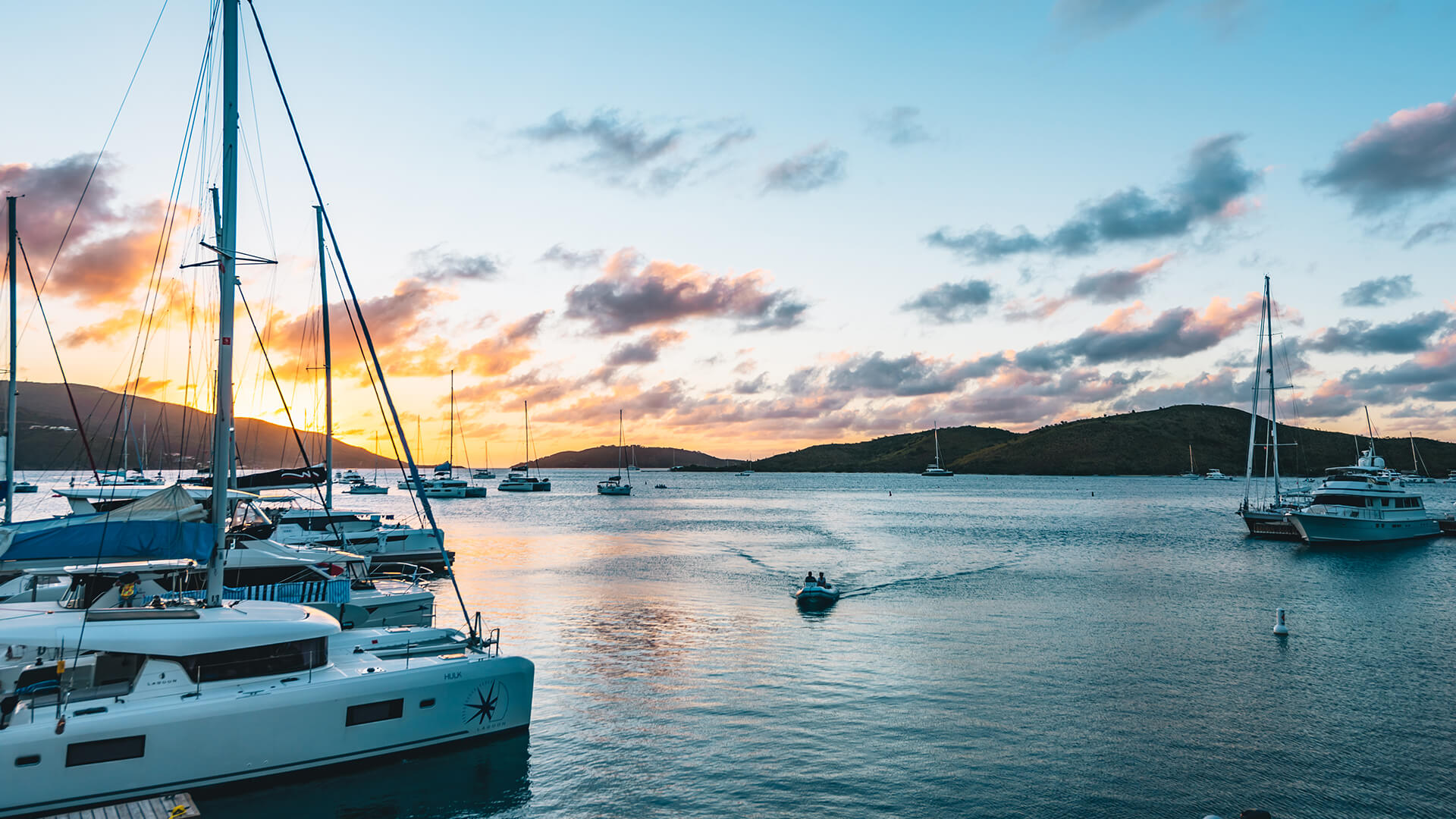 a group of boats in a body of water