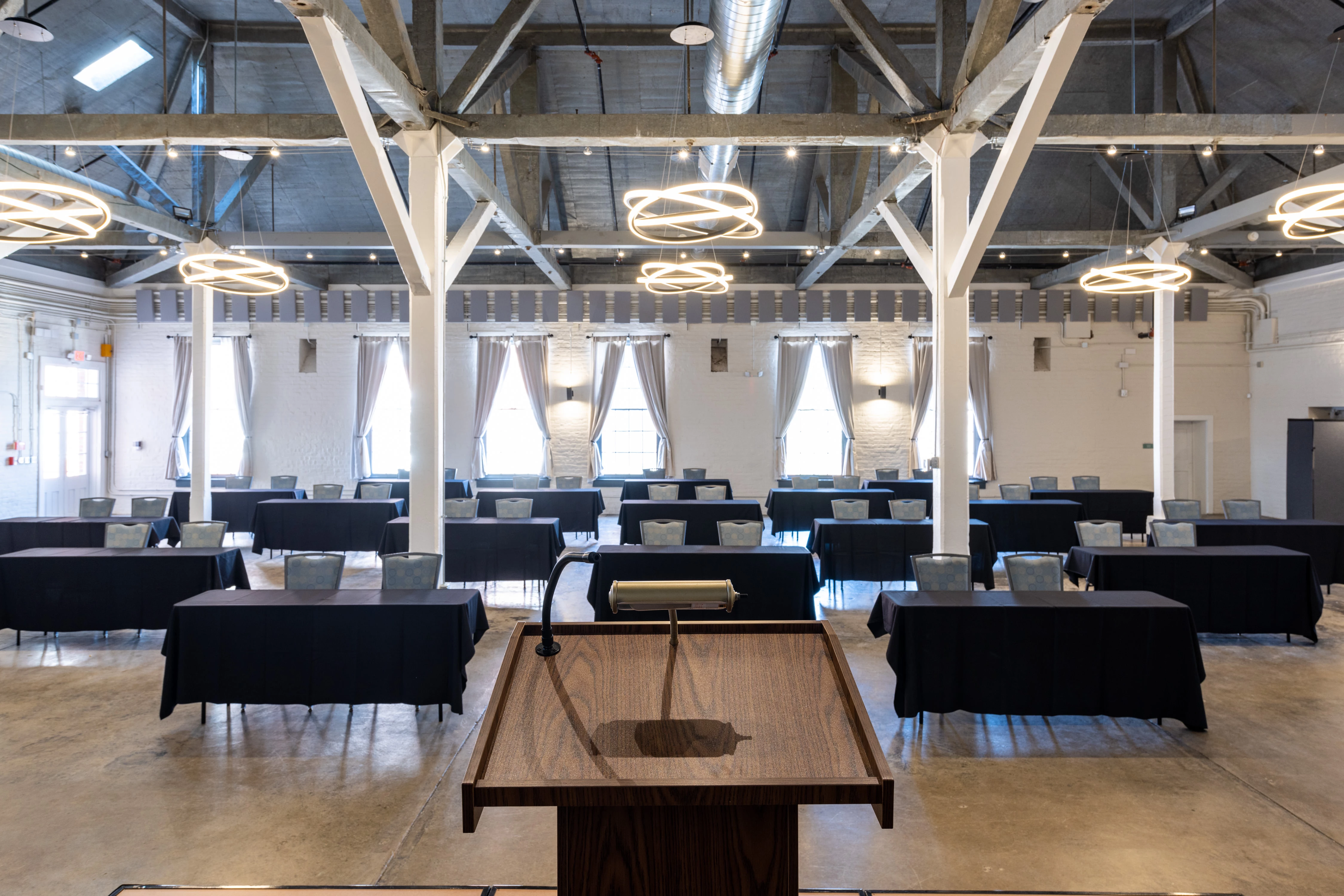 a room with tables and chairs