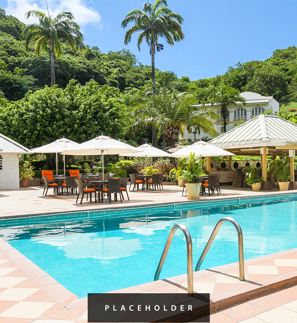 a pool with umbrellas and tables and chairs