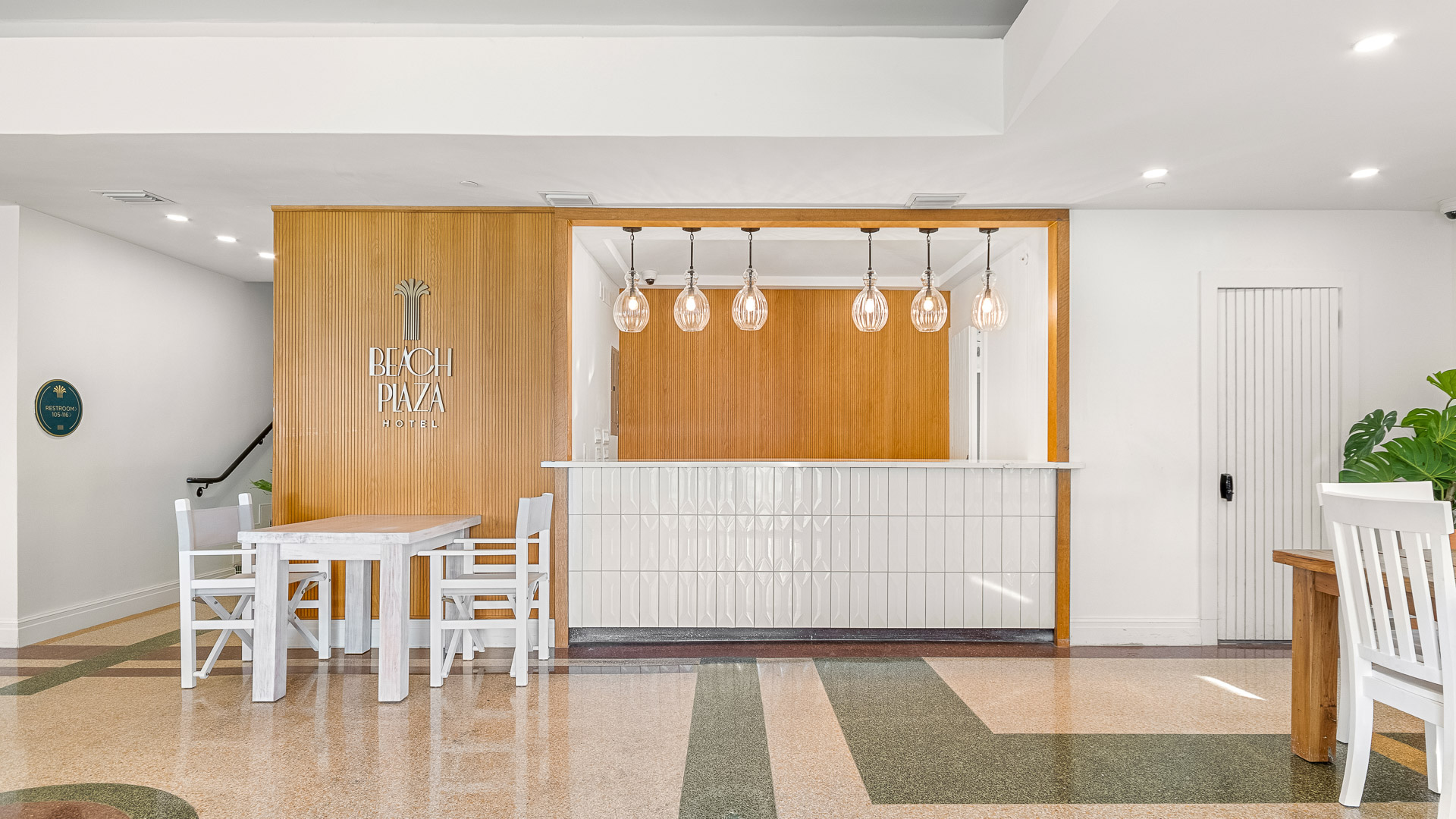 a white table and chairs in a room