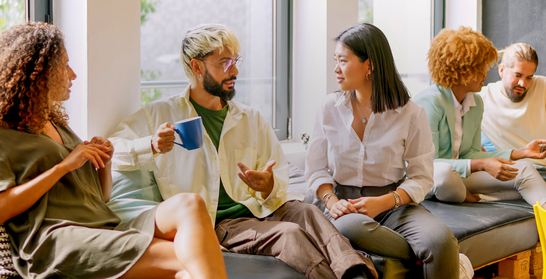 a man and woman sitting on a couch