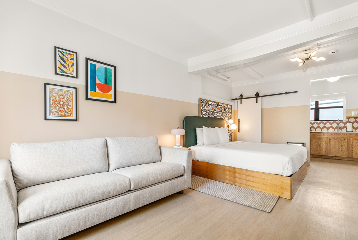 a room with a bed and a couch