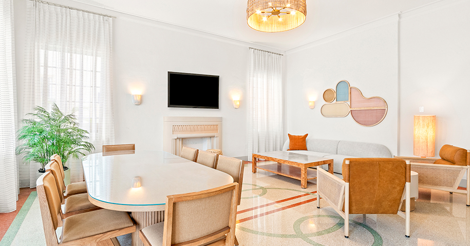 a room with a table and chairs