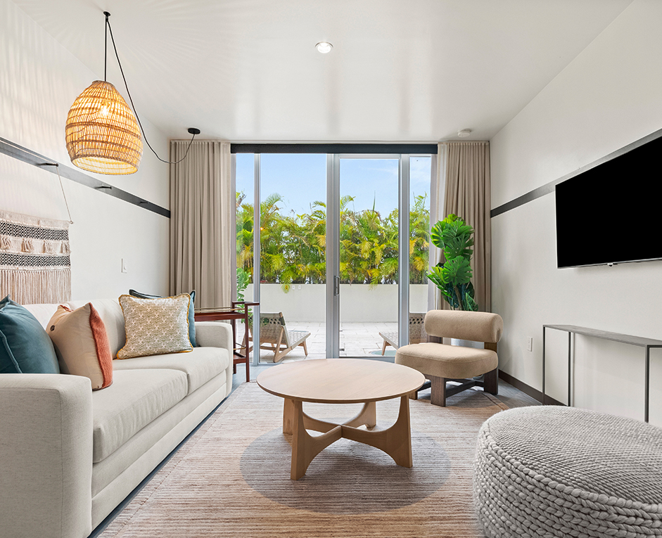 a living room with a television and a couch