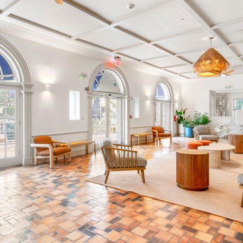 a room with chairs and tables