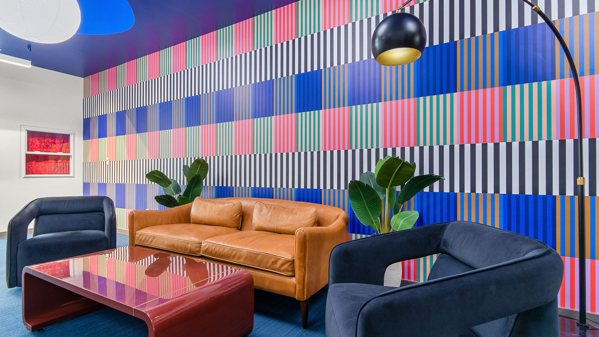 a couches and chairs in a room