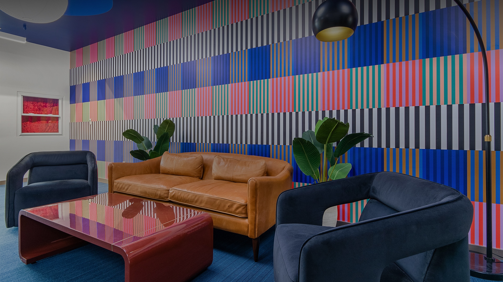 a couches and chairs in a room