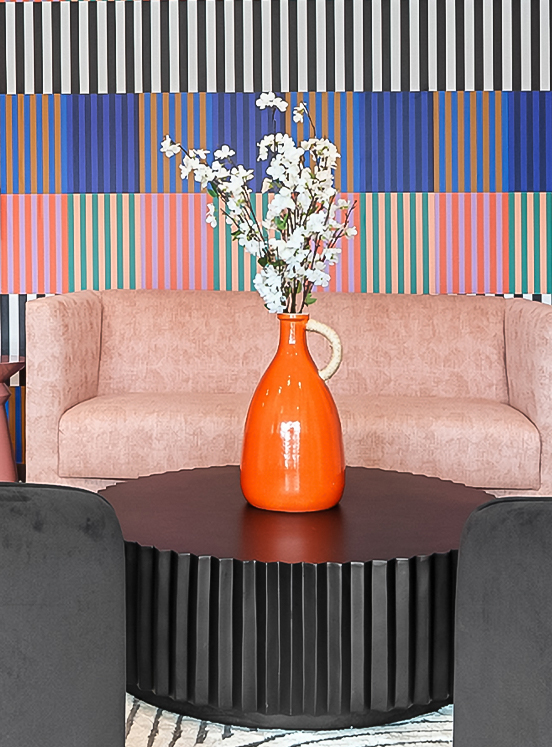 a vase with flowers on a table