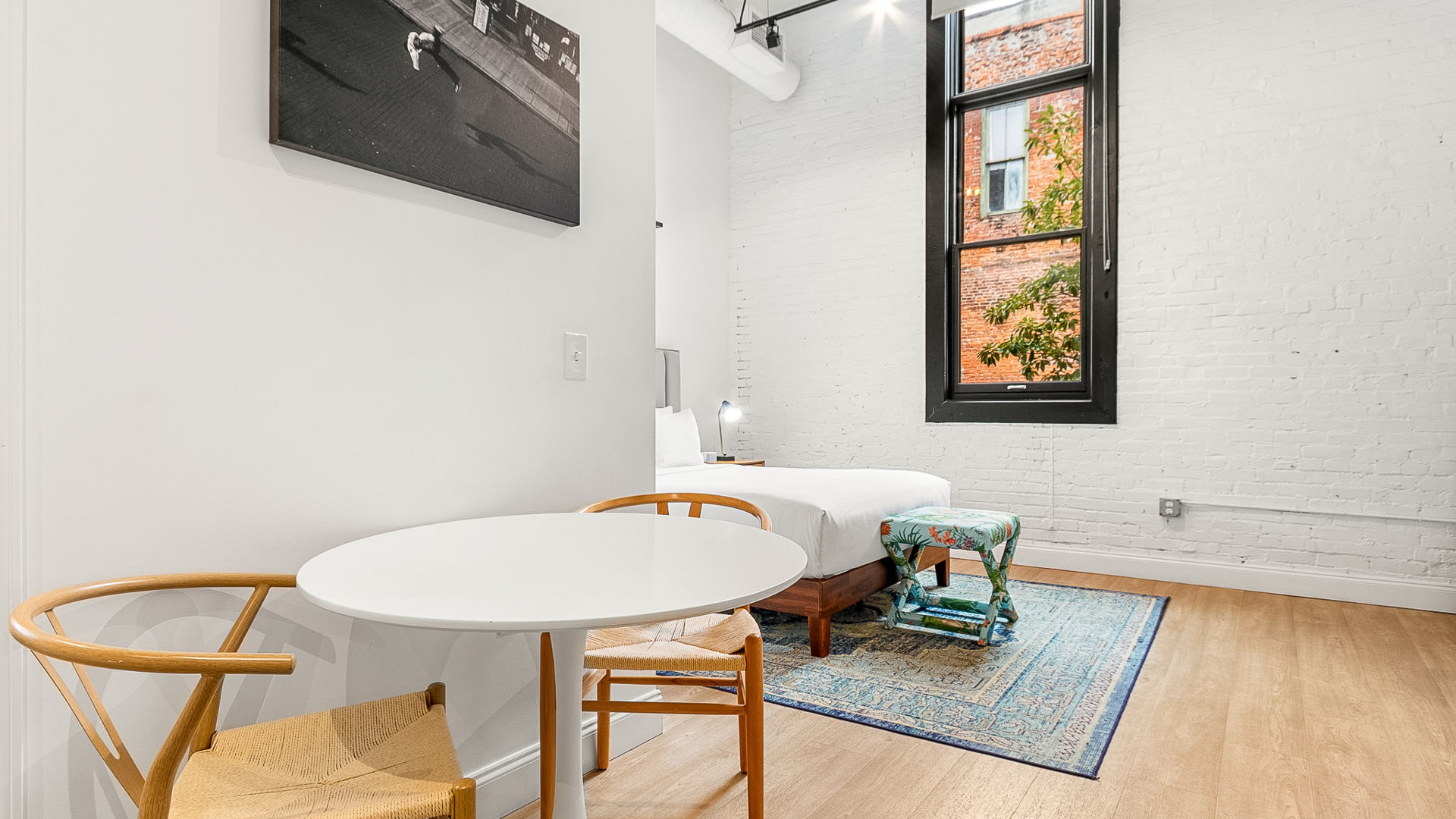 a room with a bed and a table