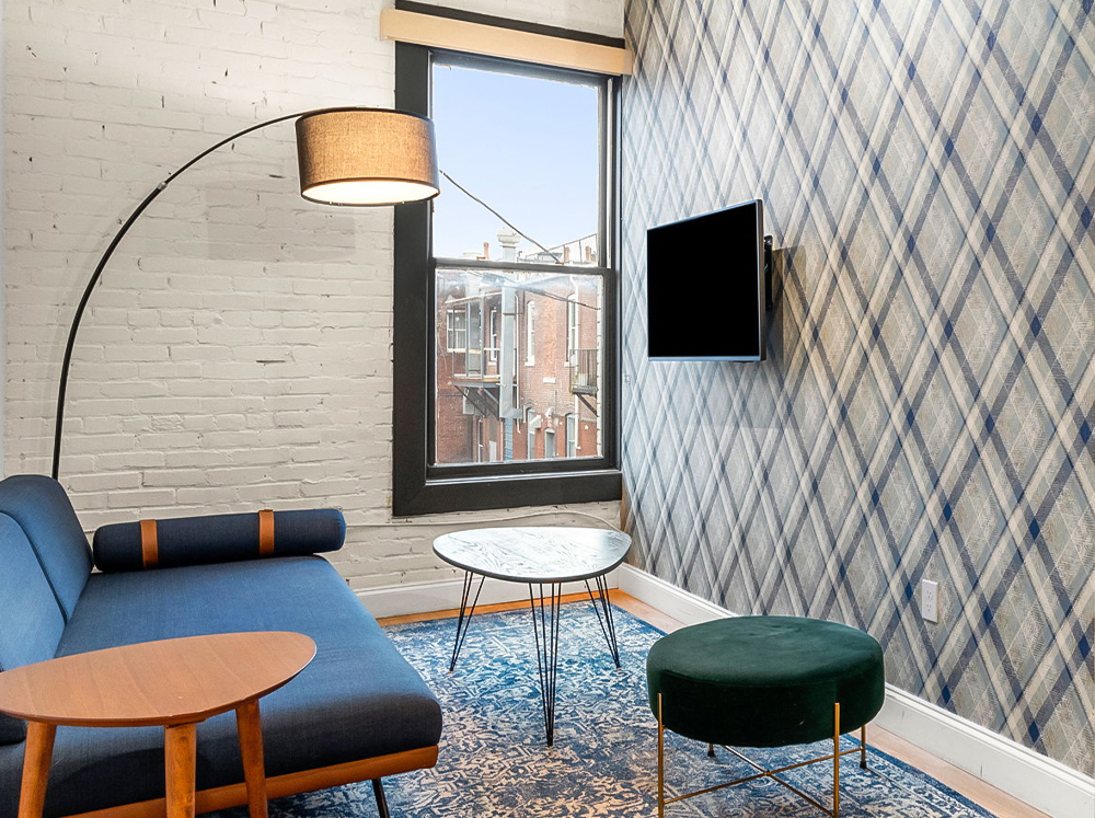 a room with a couch and a tv