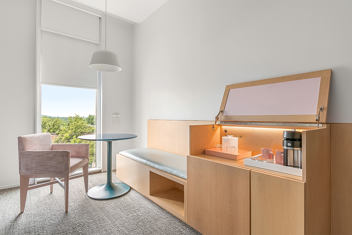 a room with a table and chairs