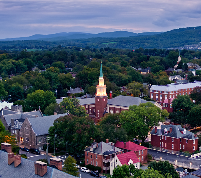 a city with a tower and trees