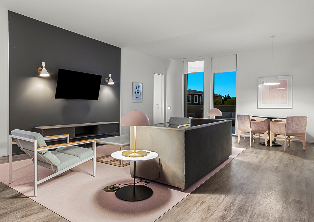 a living room with a couch and a tv