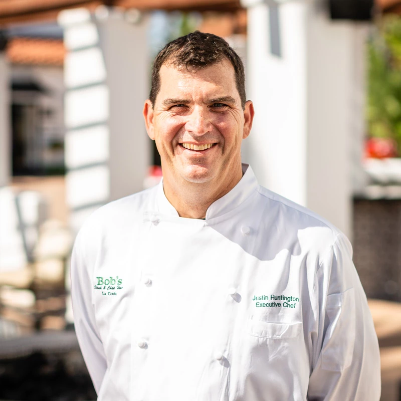 a man wearing a white shirt